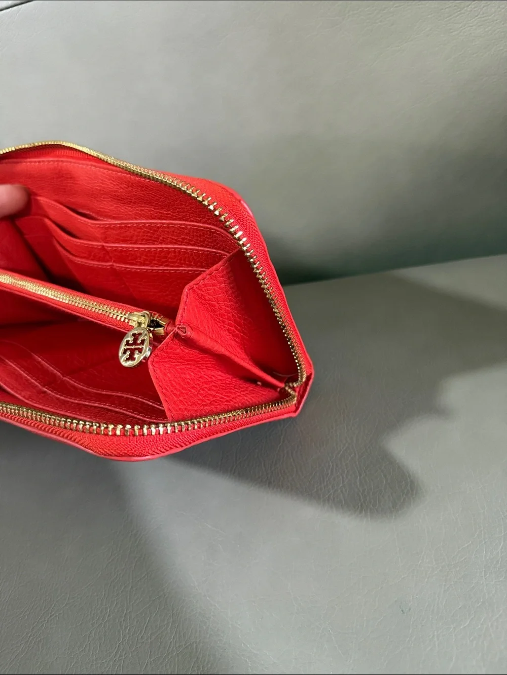 Tory Burch orange Pebbled Leather Zip Wallet with Gold Logo